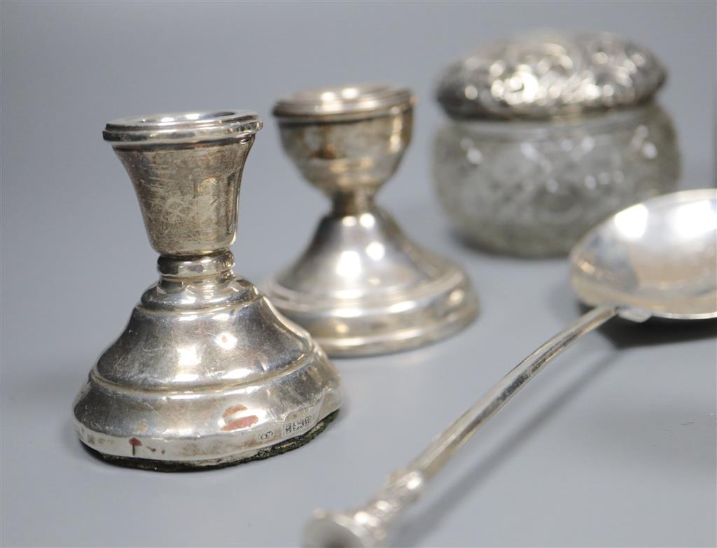 A silver Christening mug, a pair of silver seal top spoons and sundry silver,